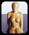 Poolside -  acacia figurative sculpture by Christopher Rebele